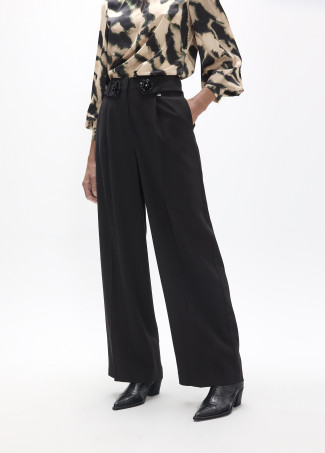 Pantalon palazzo long avec détail fleur à la taille