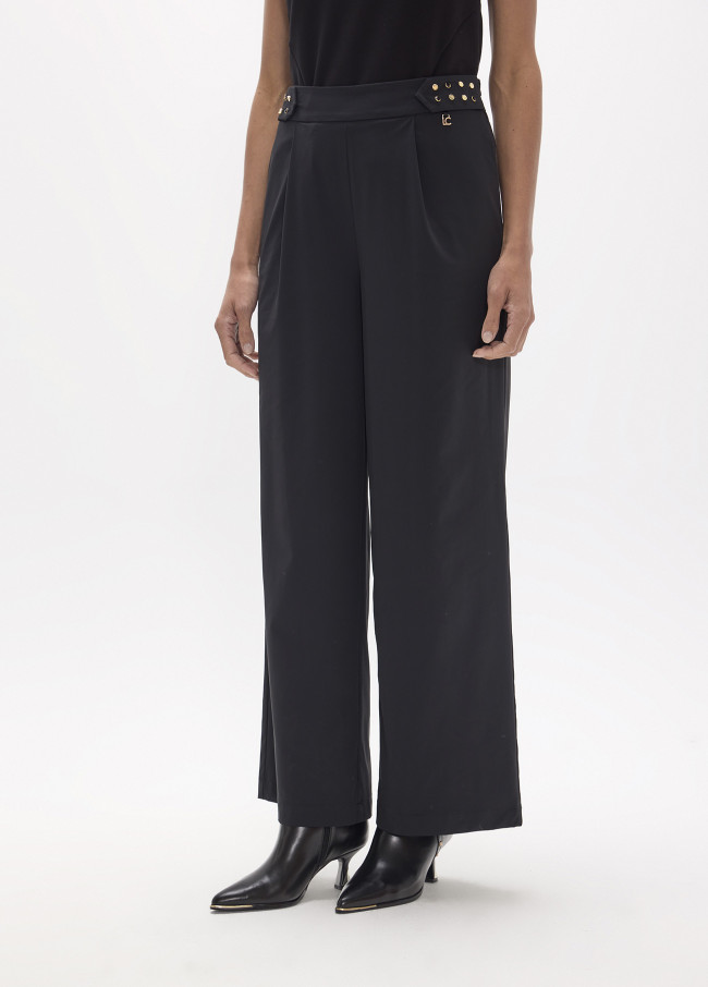 Pantaloni tecnici lunghi con cinturino borchiato