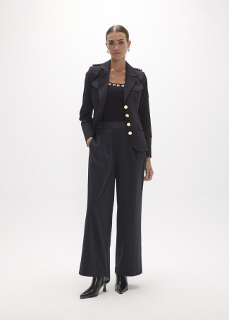 Pantalón técnico con tachas