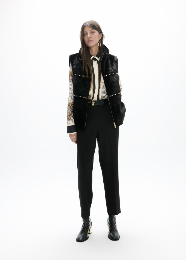 Gilet à détails métalliques