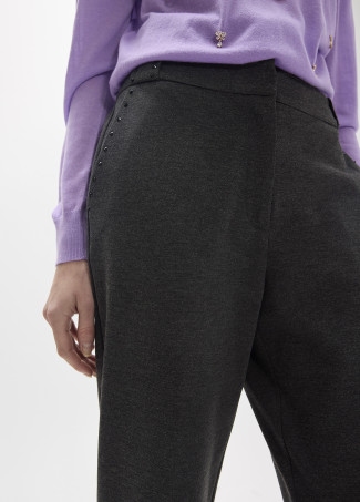 Pantaloni effetto pelle con strass