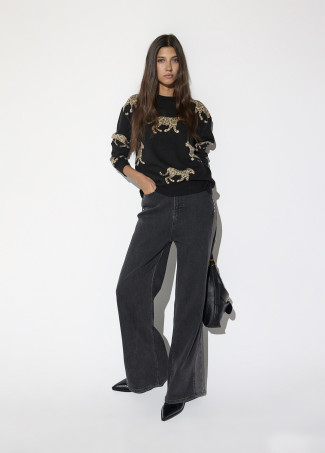 Jersey leopardo con detalle collar y logo