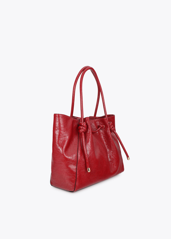 Sac cabas avec détail tube métallique et logo...