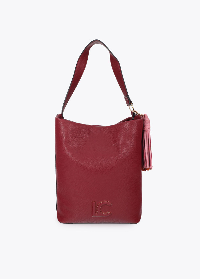 Shopper con detalle logo en el asa y pompones