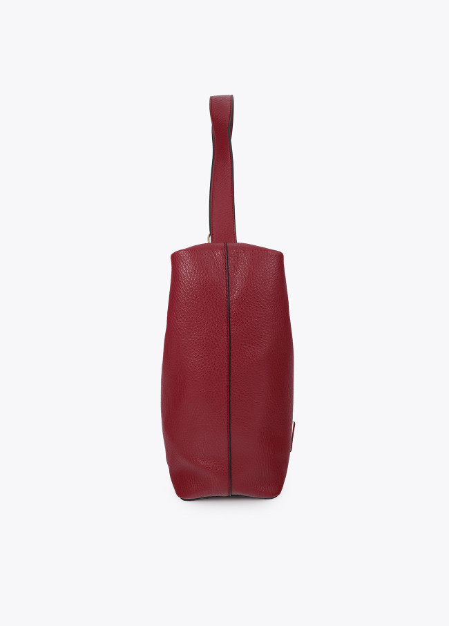 Shopper effetto pelle con logo e dettagli in nappe