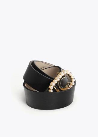 Ceinture réversible avec boucle ovale et perles incrustées.