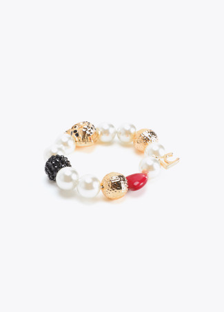 Pulsera perlas y charms