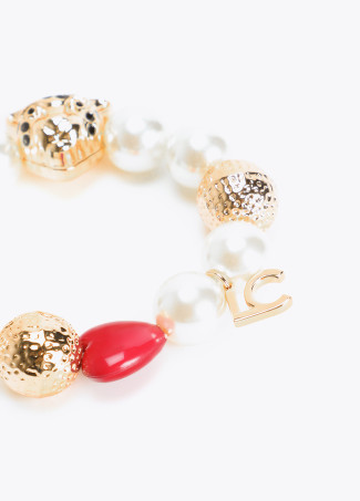 Pulsera perlas y charms