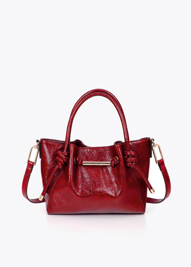 Schultertasche mit Metallrohrdetail und ausgeschnittenem...