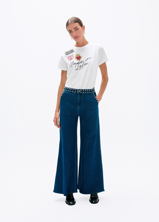 Jean flare avec clous à la taille et poches avant