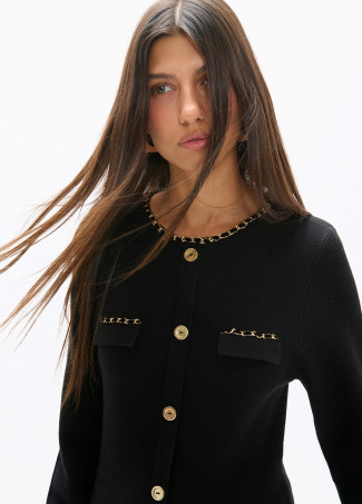 Vestido tricot detalle cadenas